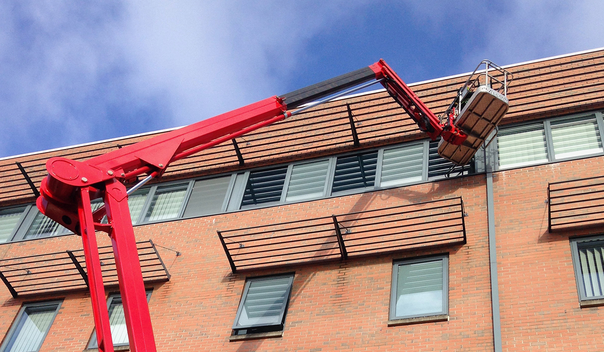 Cherry picker hire for building maintenance to South Wales Police Station, Cardiff Bay